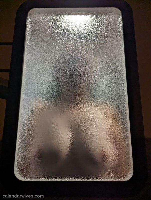 Wife titties through the frosty glass