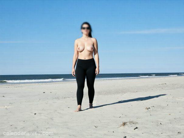 Topless wife on the beach